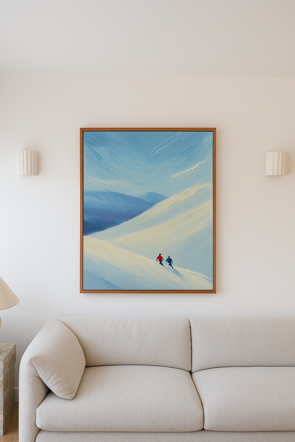 Two climbers painting on snowy mountain.