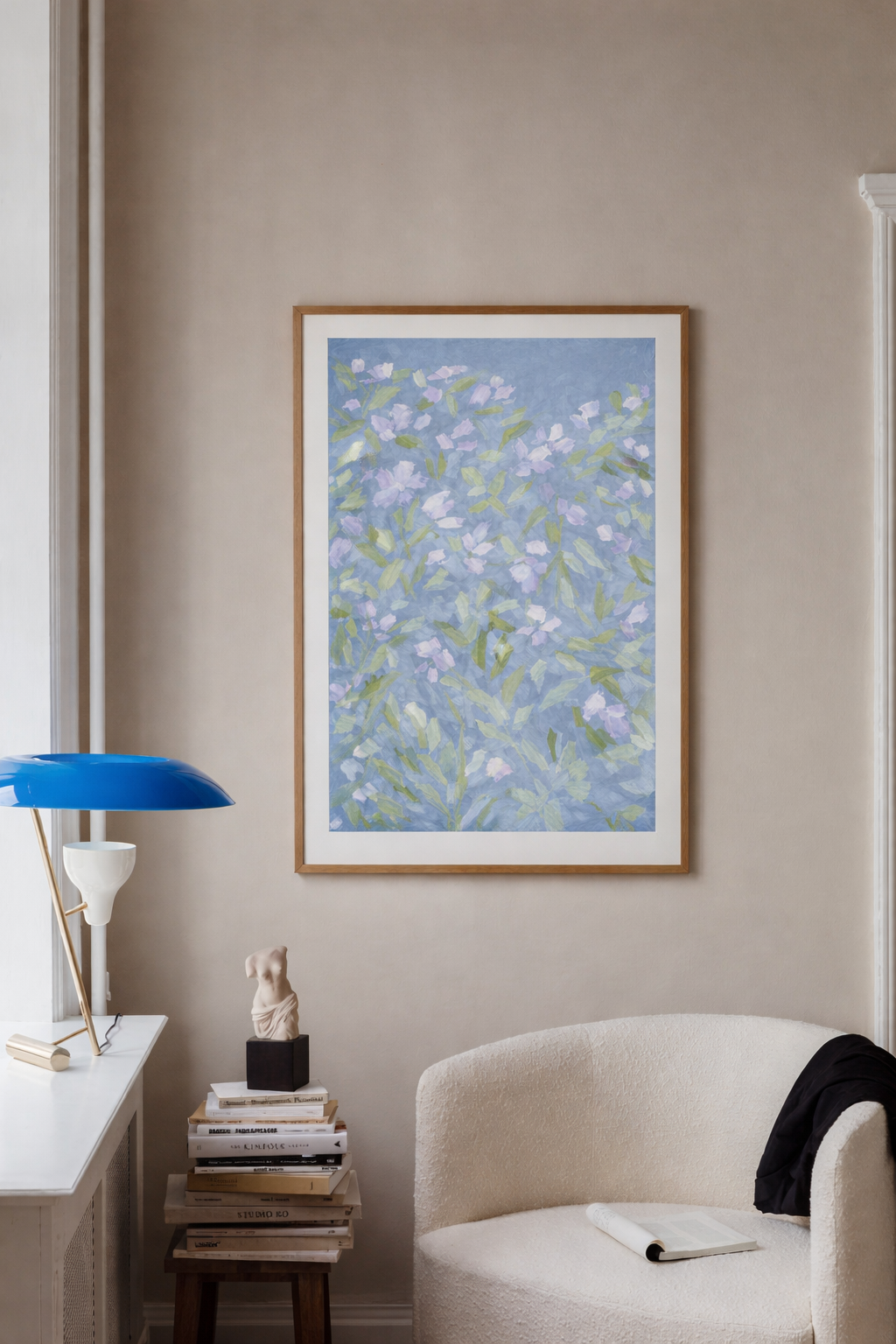Blue botanical wall art with white and lavender flowers